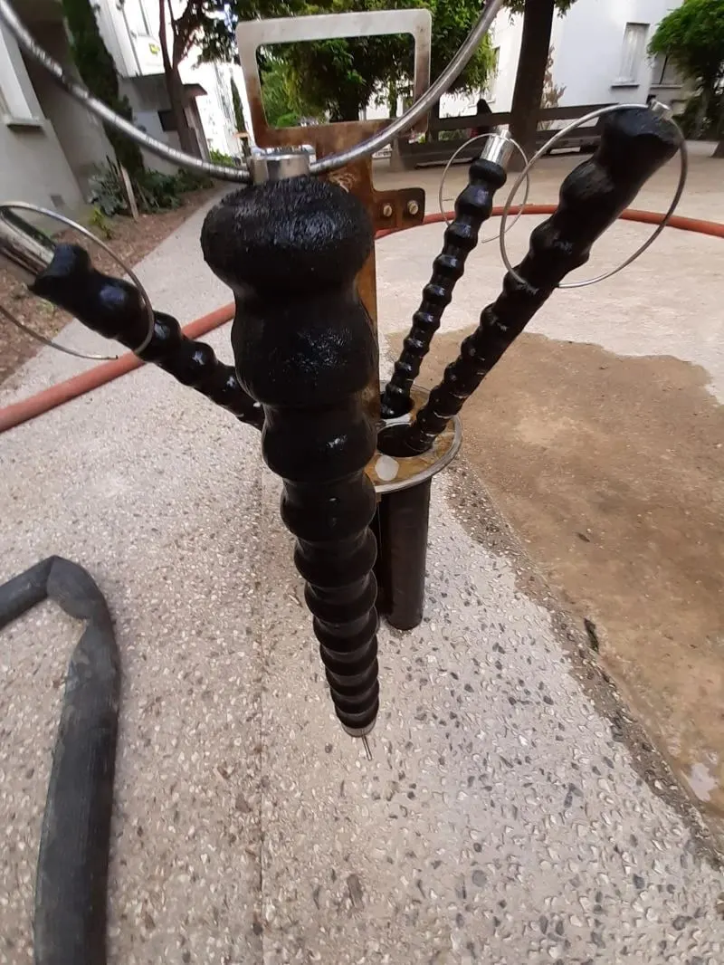 Raccordement des flexibles de rinçage sur un collecteur de chauffage